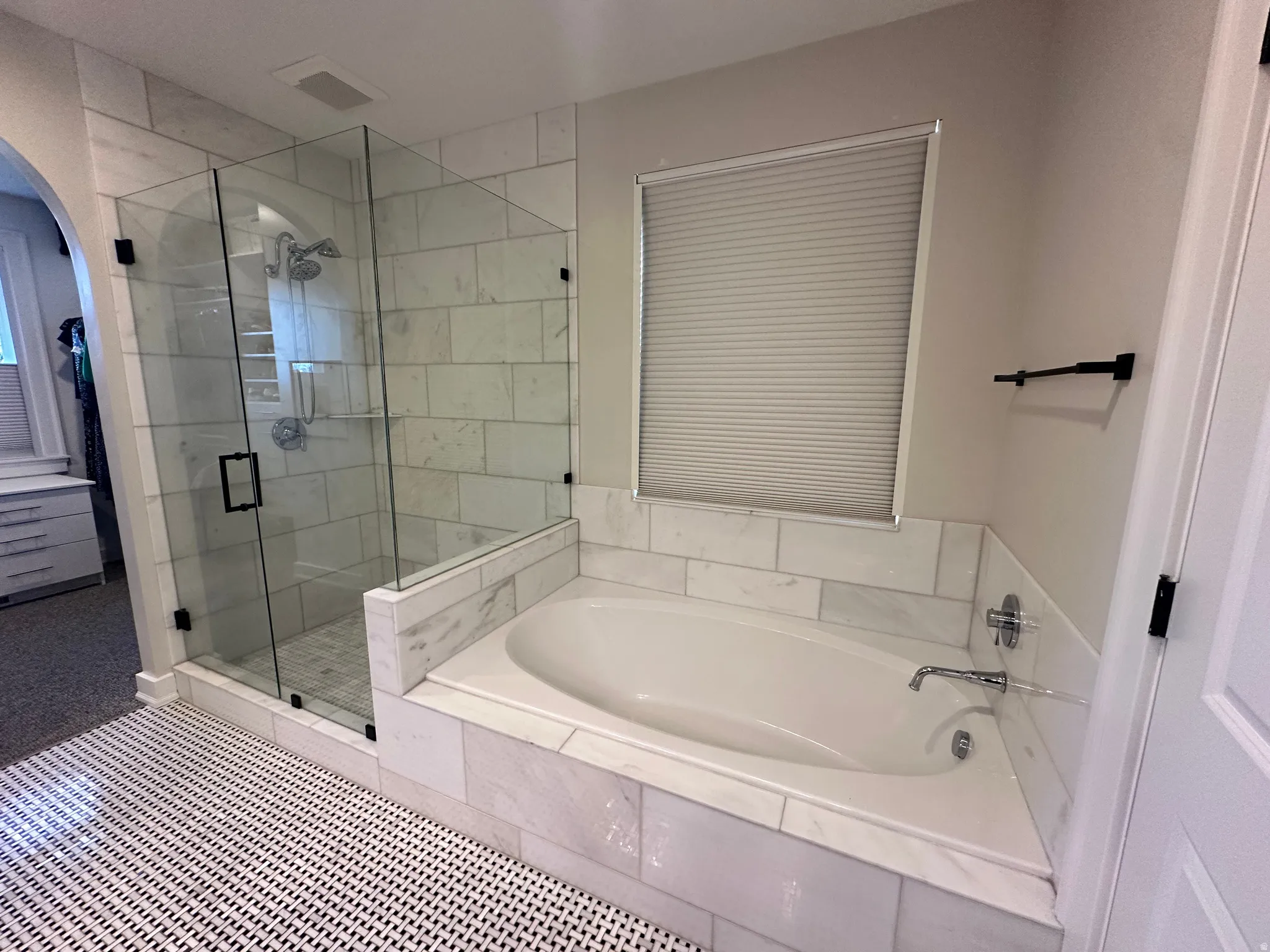 Master Bathroom with a stall shower and a bath