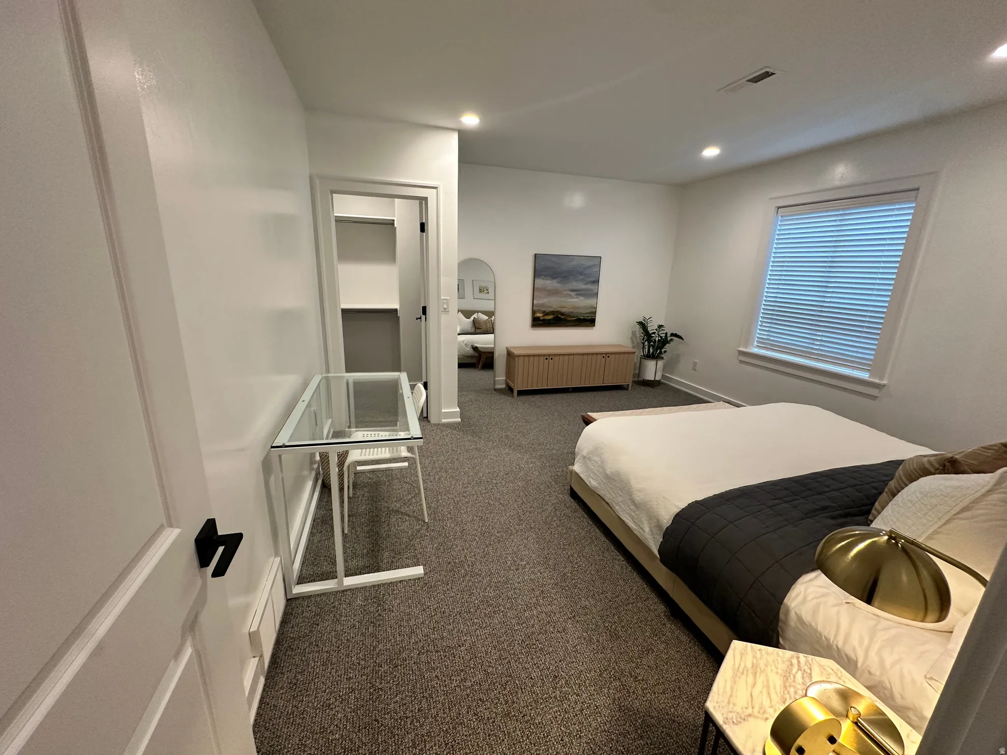 #2 Basement Bedroom with dark carpet and recessed lighting