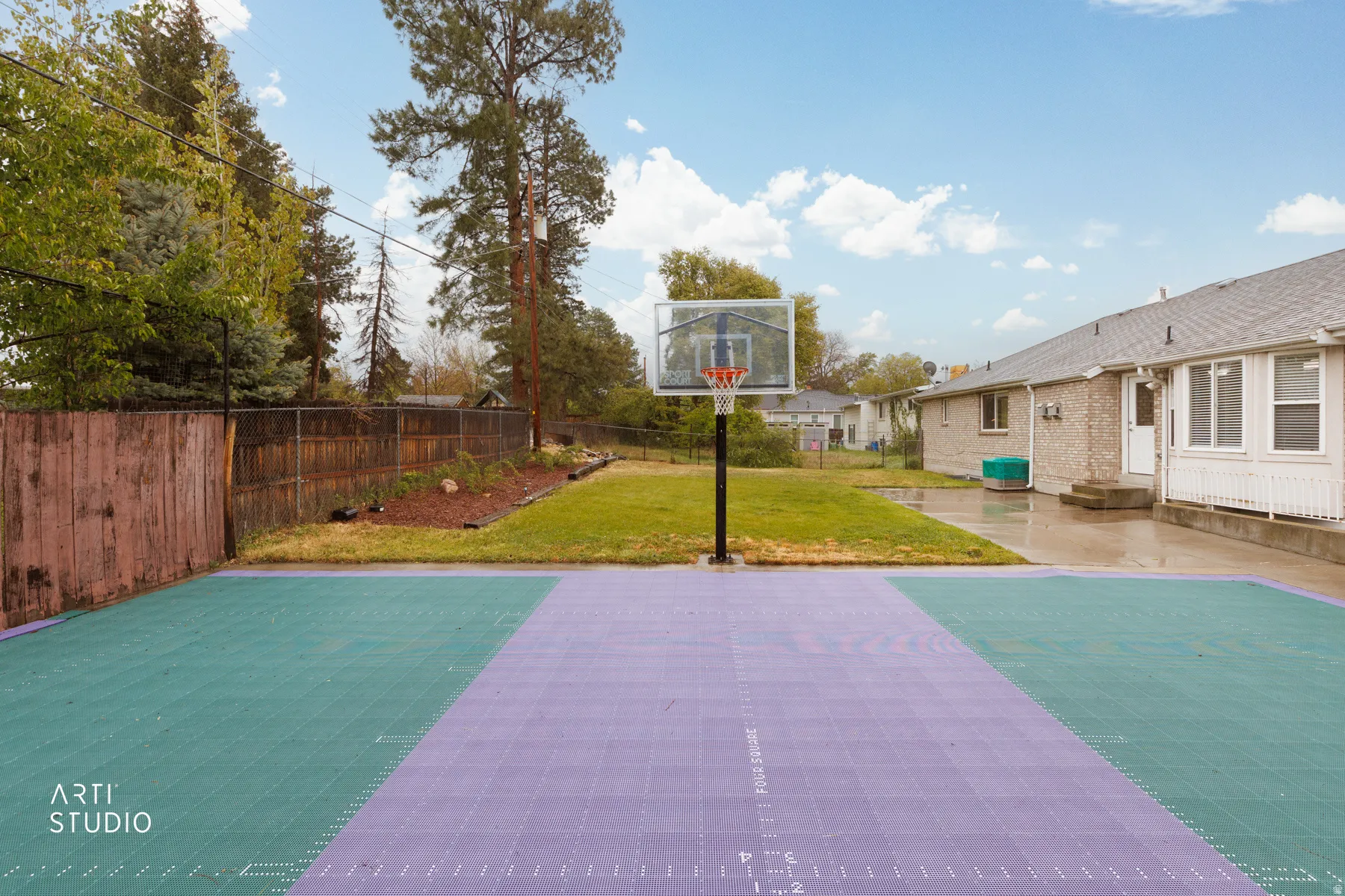 View of sport court with a fenced backyard, a patio, and basketball hoop