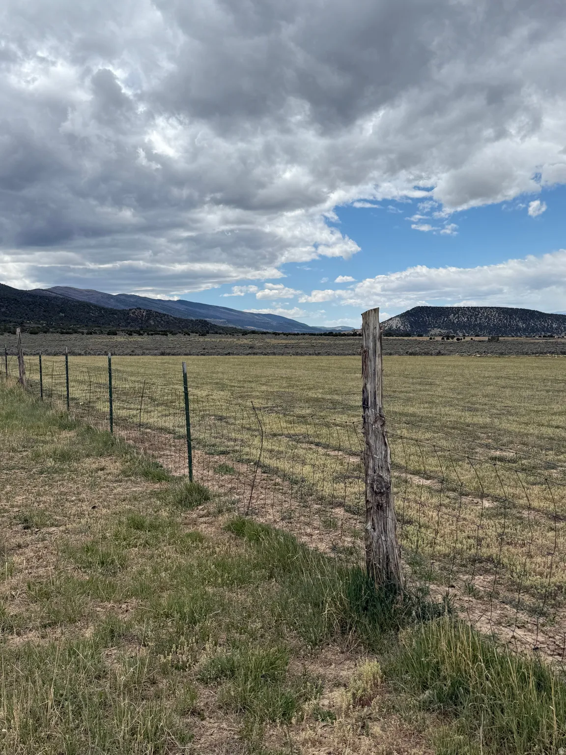 View of yard featuring a mountain view and a rural view