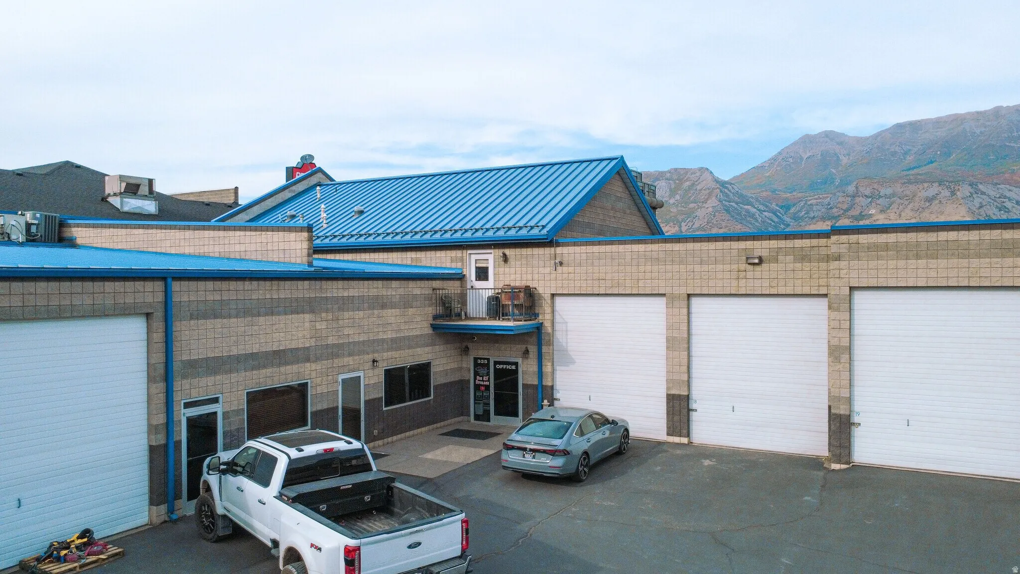 View of building exterior featuring a mountain view