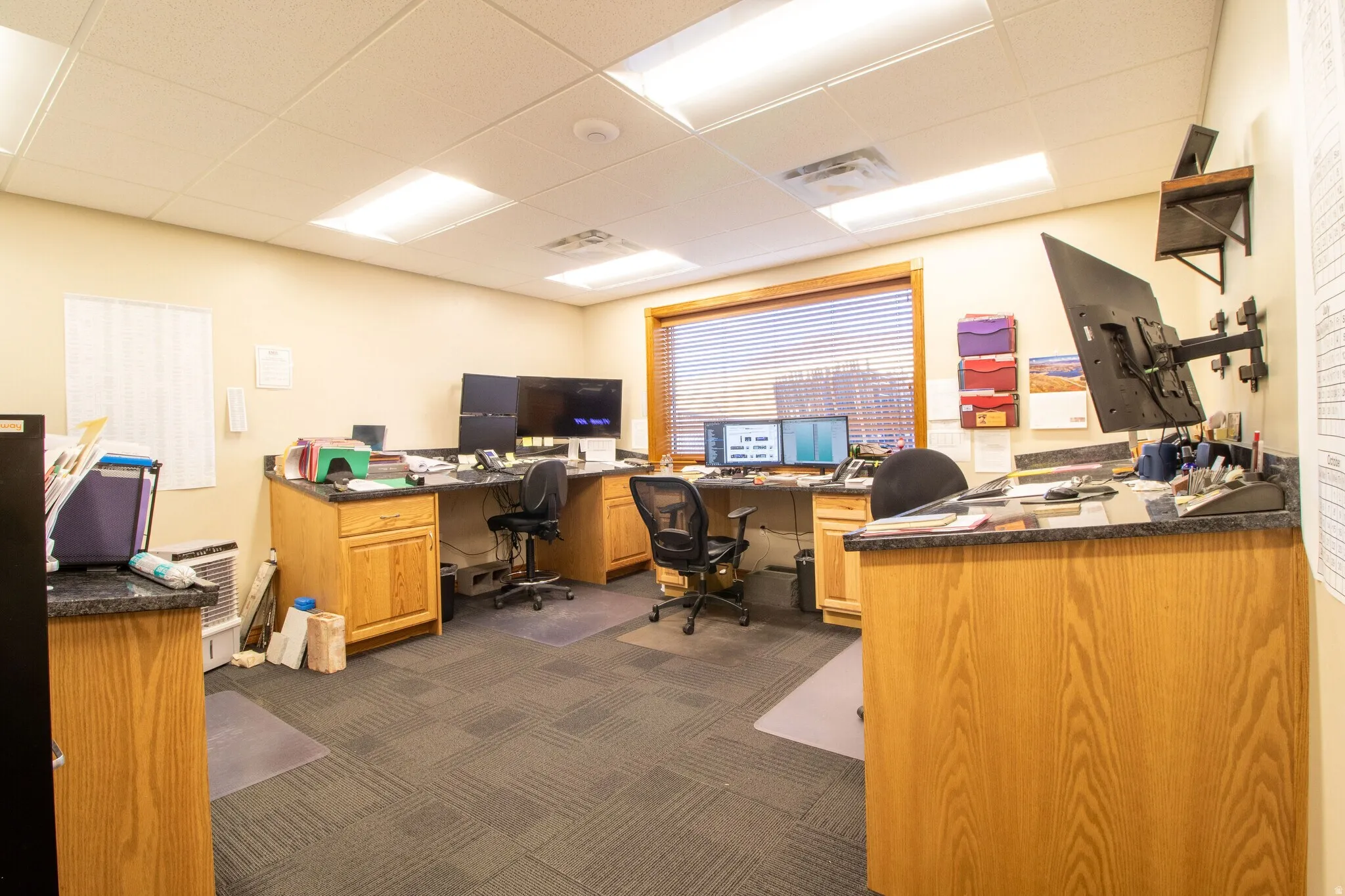 Office space with a drop ceiling
