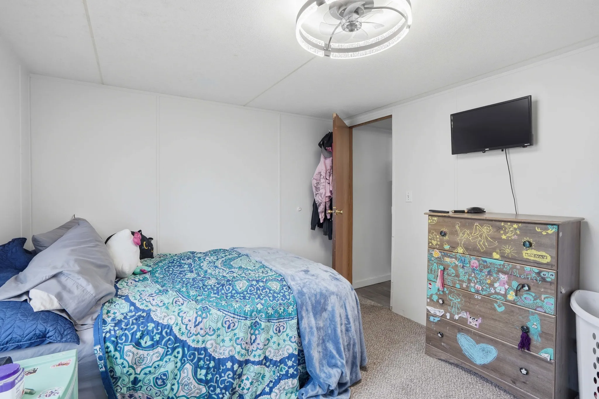 Bedroom with light carpet