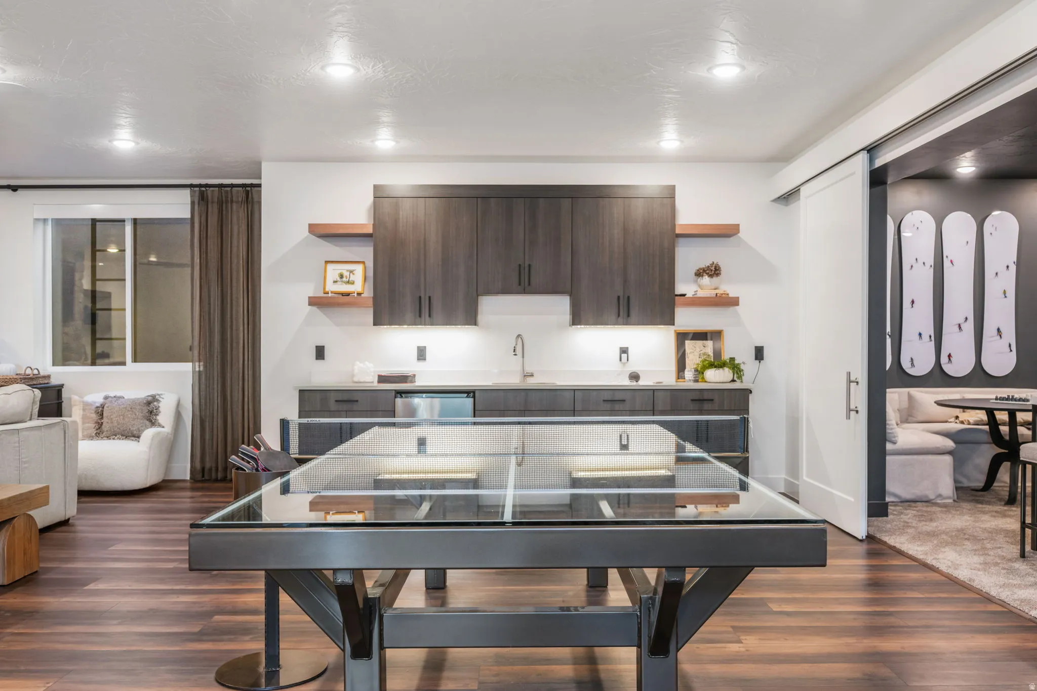 Playroom featuring dark wood-style floors and recessed lighting