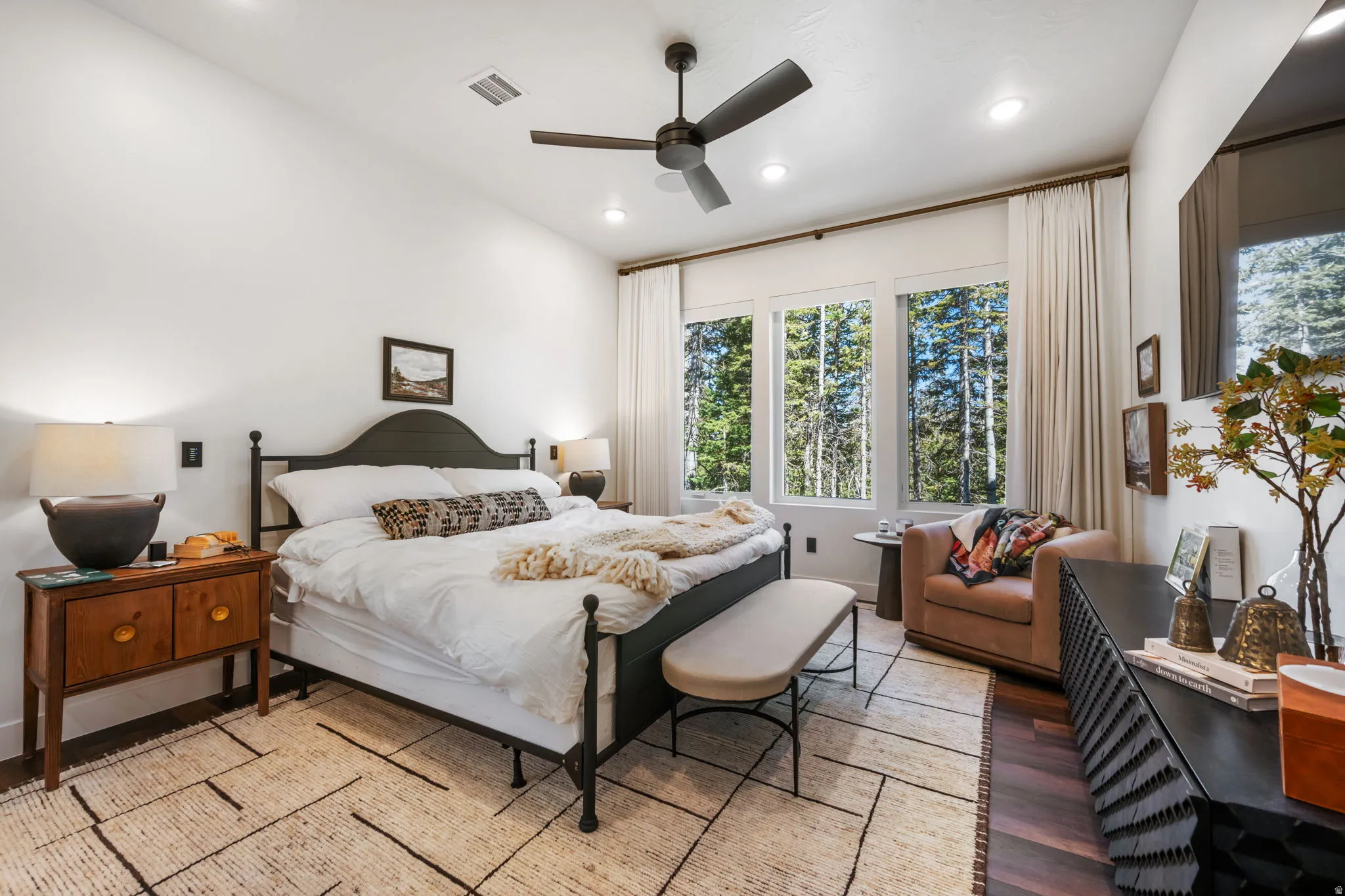 Bedroom featuring ceiling fan, wood finished floors, and recessed lighting