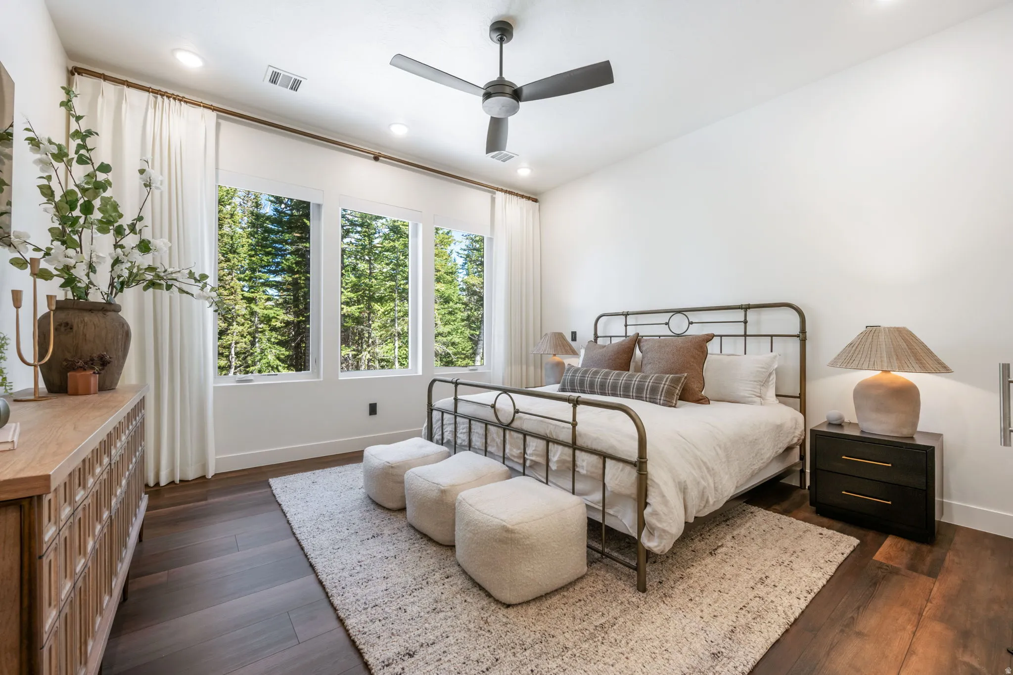 Bedroom with a ceiling fan, dark wood-type flooring, and recessed lighting