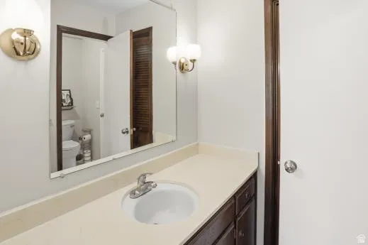 Bathroom with toilet and vanity
