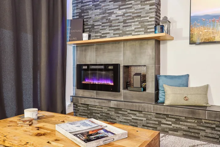 Detailed view of a glass covered fireplace