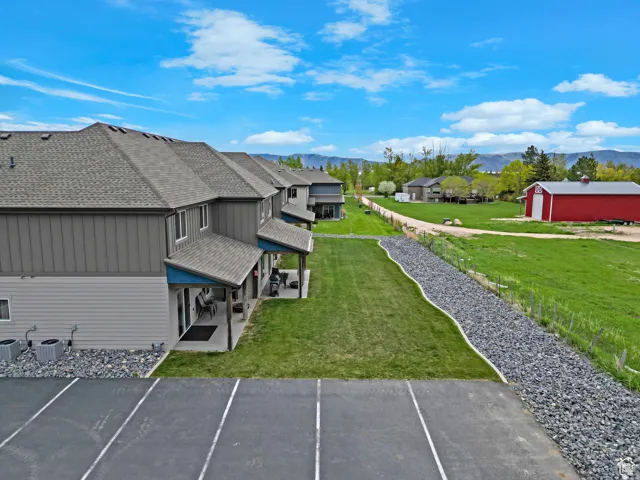 Aerial perspective of suburban area with a mountain backdrop