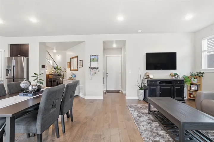 Dining room featuring light wood-style flooring and recessed lighting