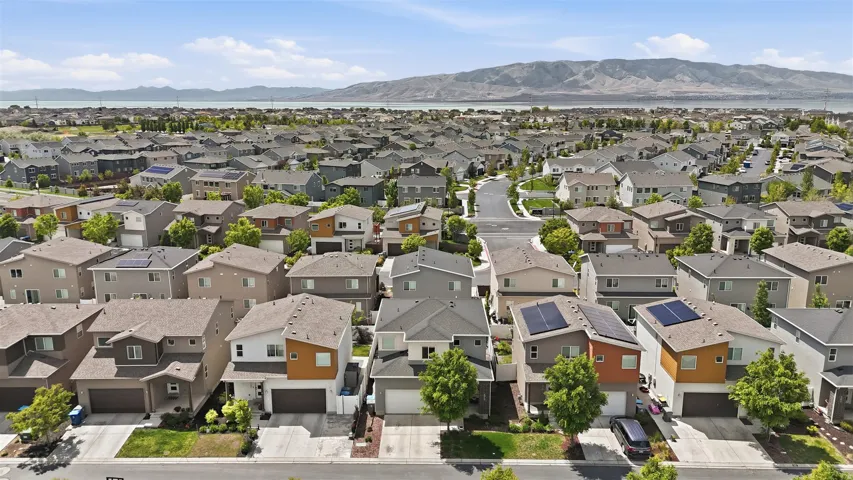Aerial perspective of suburban area featuring mountains