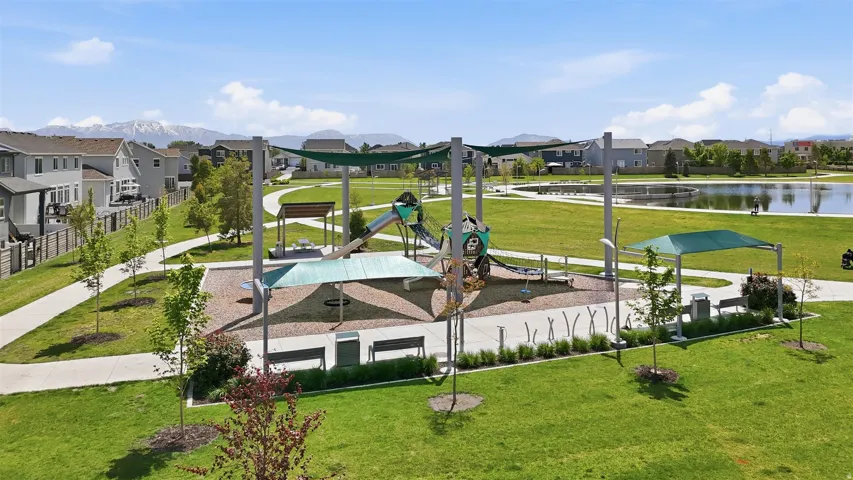 View of property's community featuring a residential view and a water view