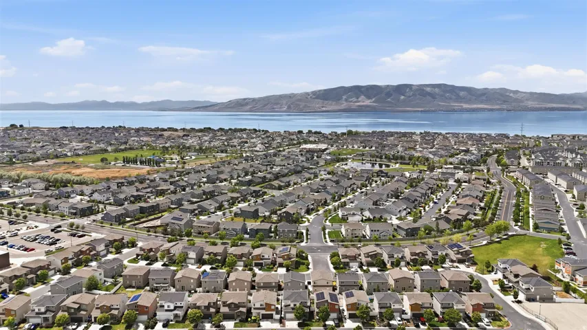 Aerial view of residential area with a water and mountain view