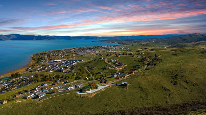 Aerial view at dusk of a water and mountain view