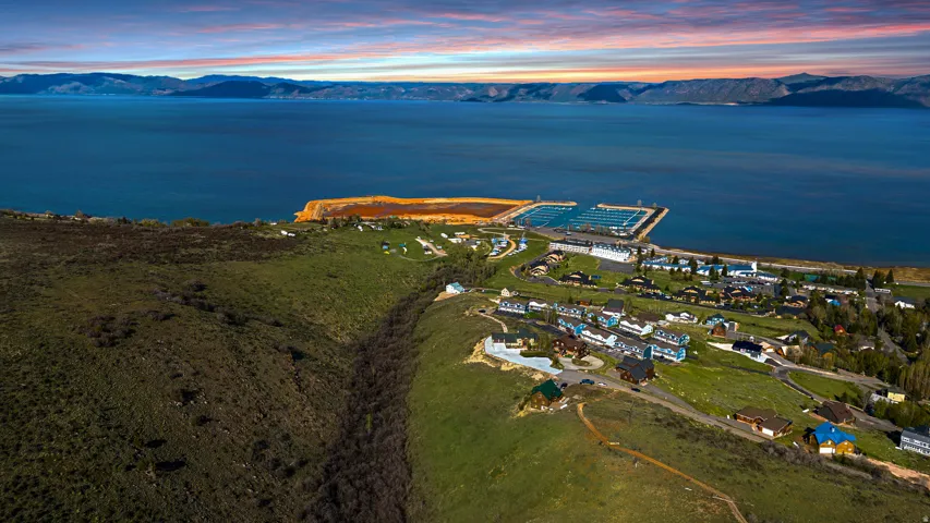 Aerial view at dusk of a water and mountain view