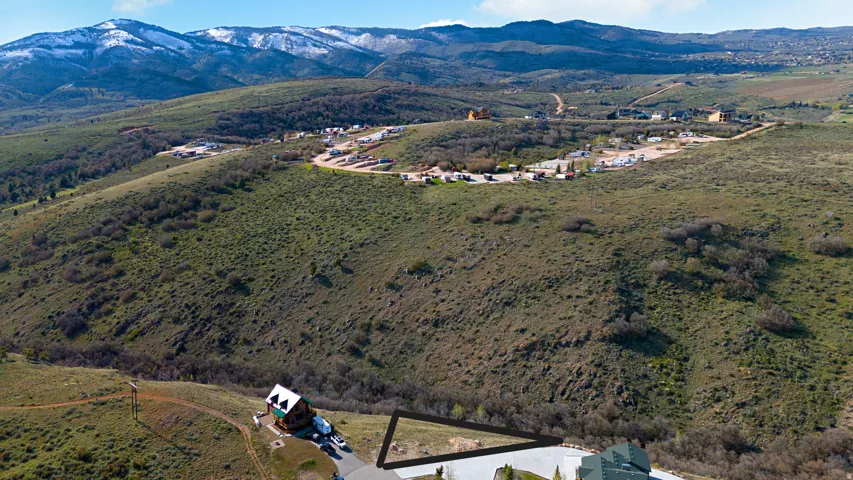 Drone / aerial view of a mountainous background