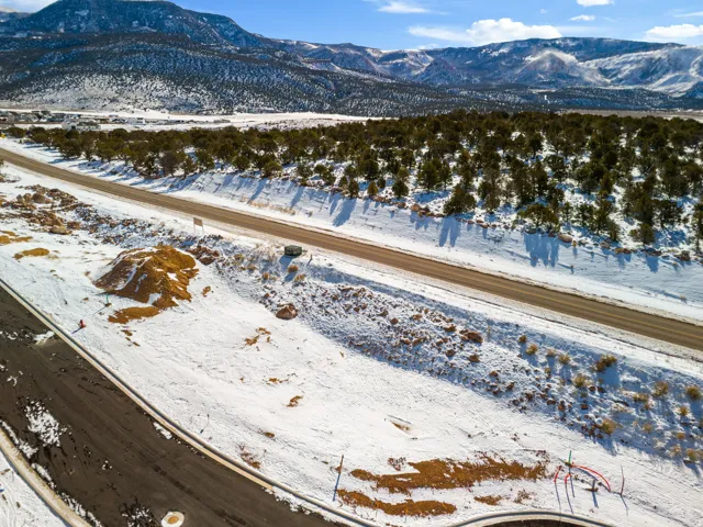 Snowy aerial view with a mountain view