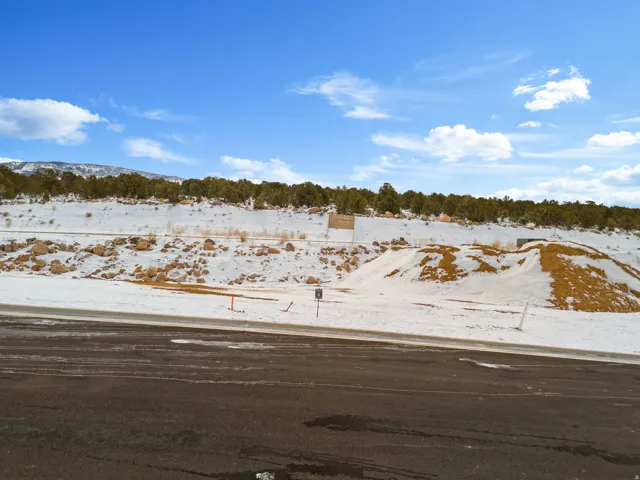 View of yard layered in snow