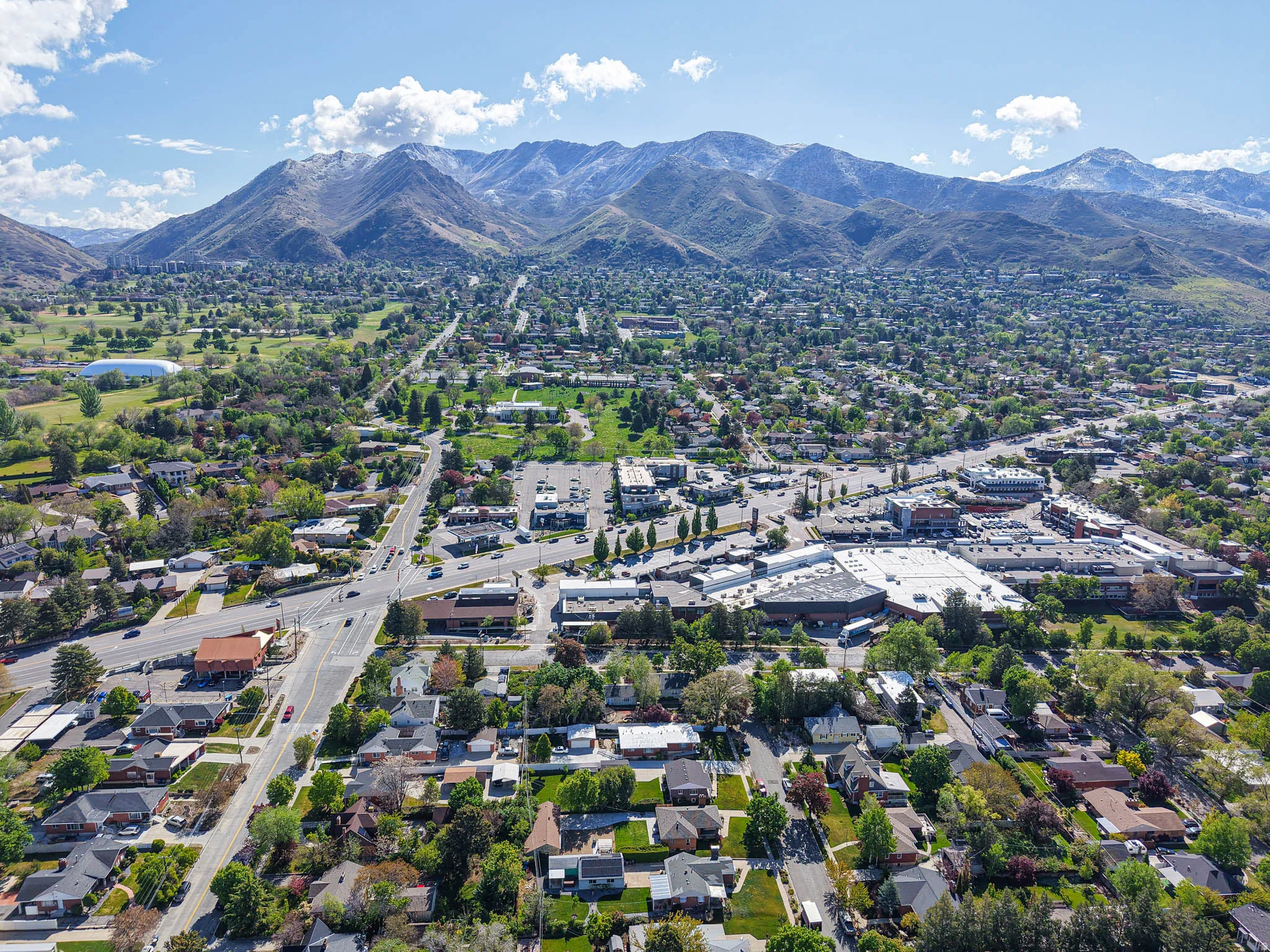 Aerial view of residential area with mountains
