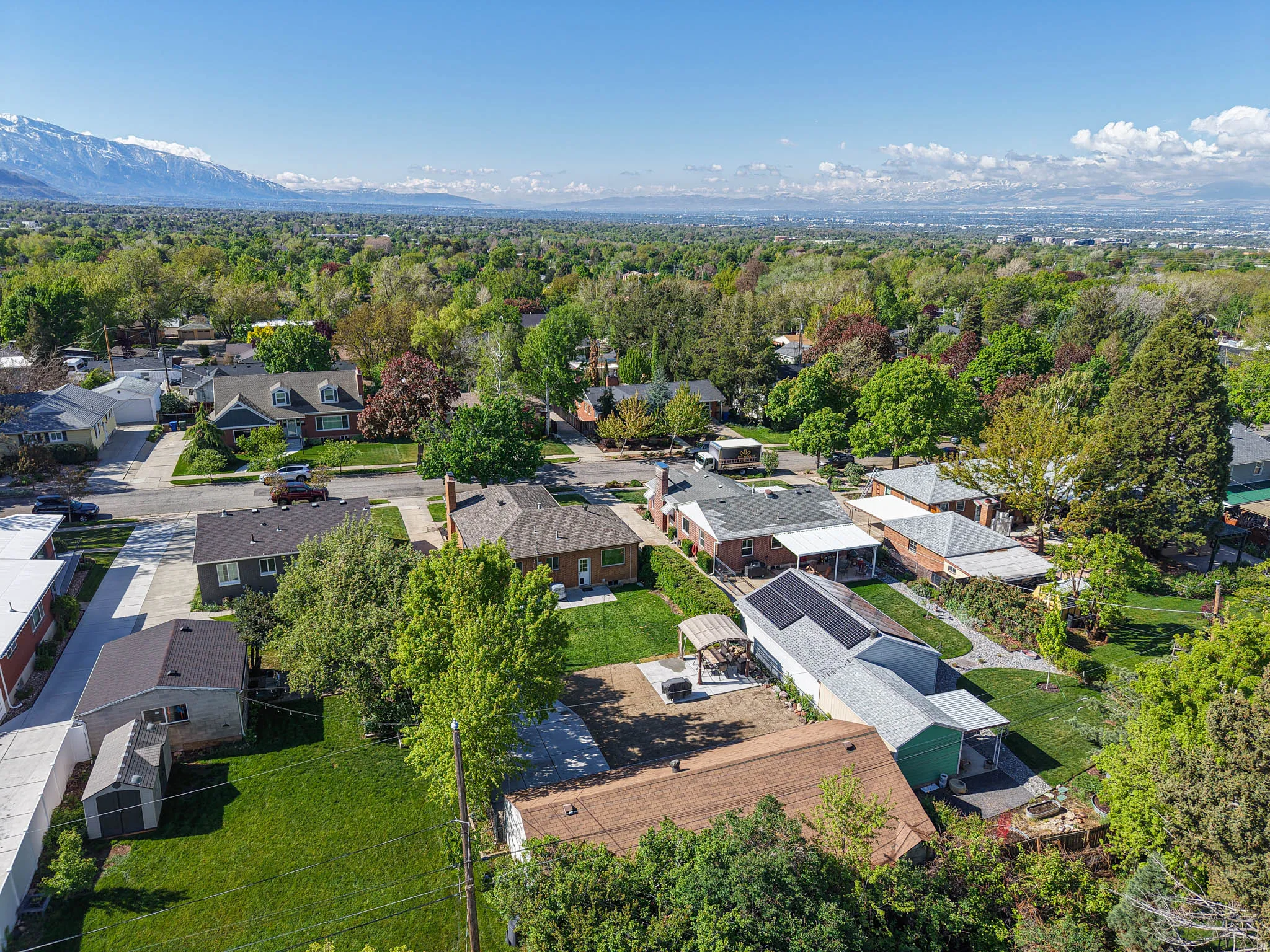 Aerial view of residential area with mountains