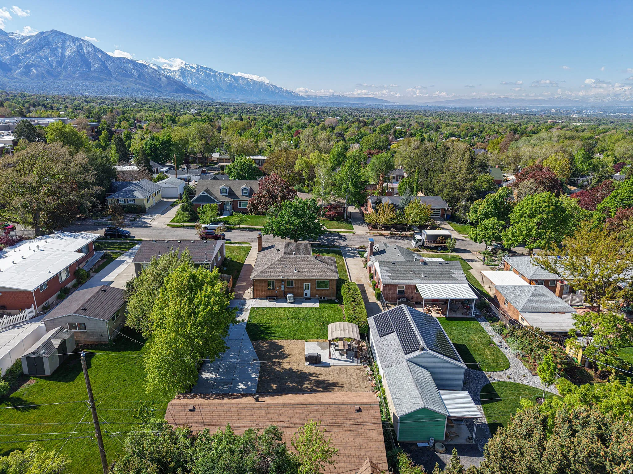 Aerial view of residential area with mountains