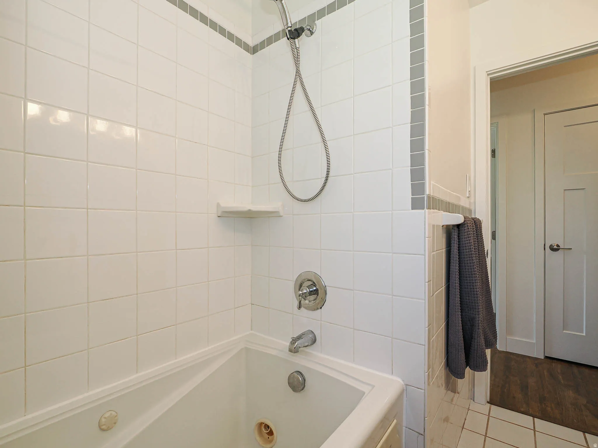 Full bathroom featuring a combined bath / shower with jetted tub
