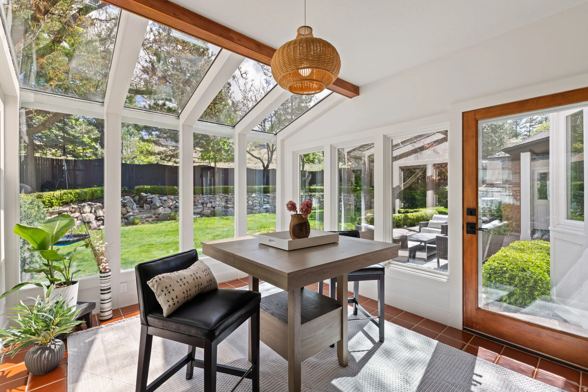 Sunroom featuring tile patterned flooring