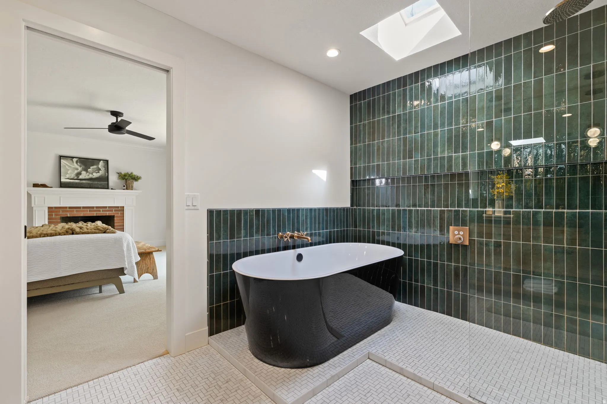 Bathroom featuring tile walls, tile patterned floors, a fireplace, recessed lighting, and a freestanding bath