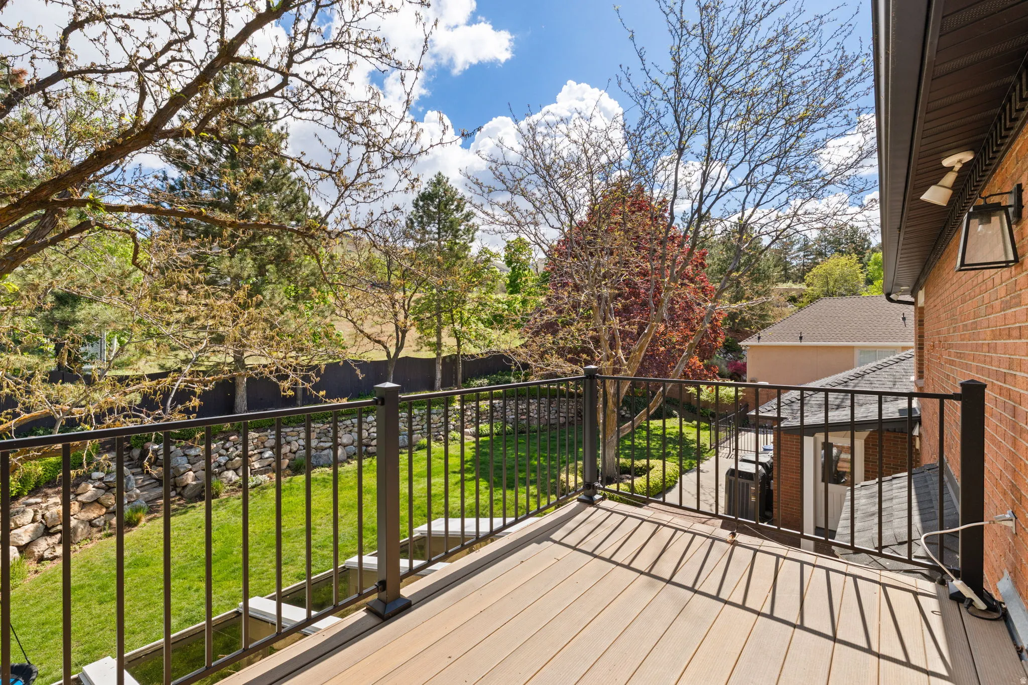 Deck featuring a lawn