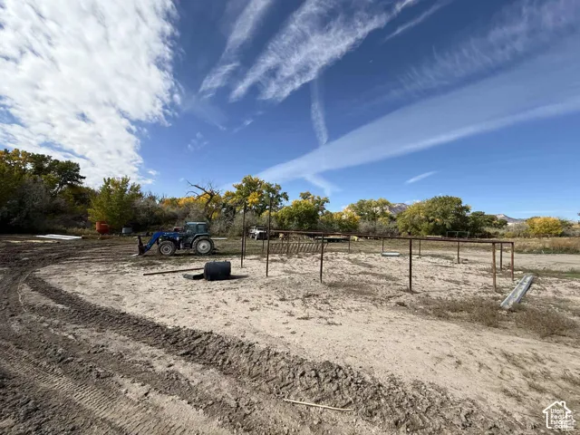 View of yard with a rural view