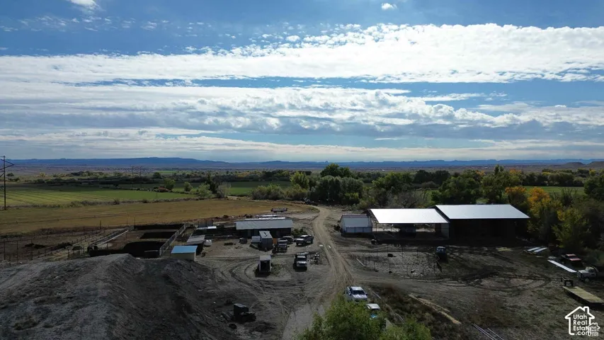 Aerial view of sparsely populated area featuring a mountainous background