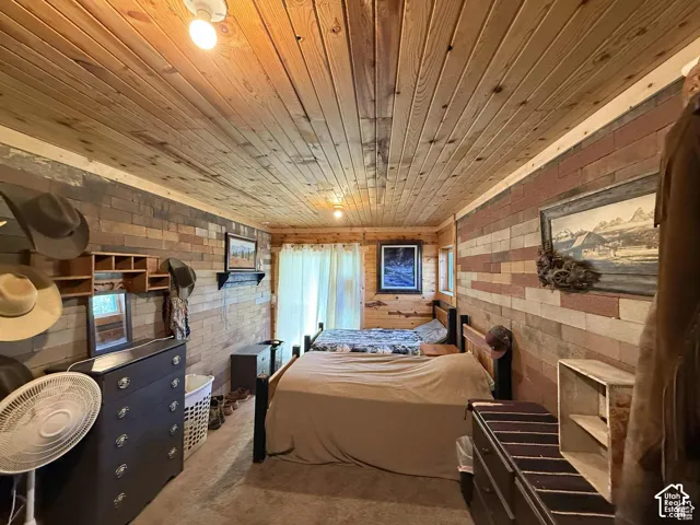 Bedroom featuring wooden ceiling