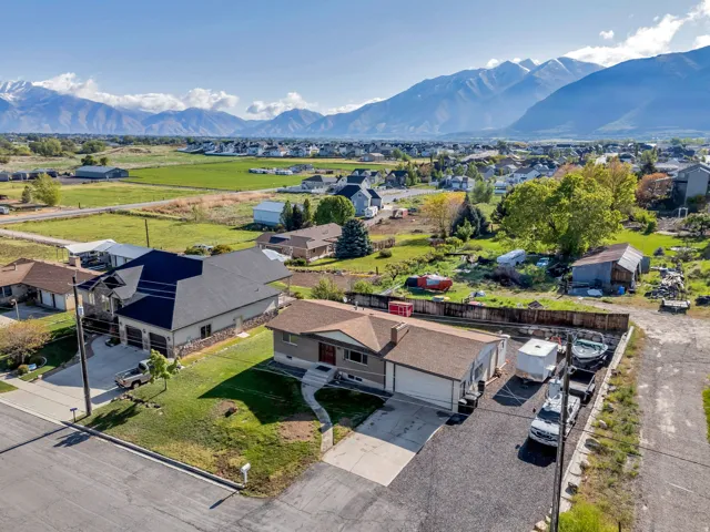 Aerial view of residential area featuring mountains