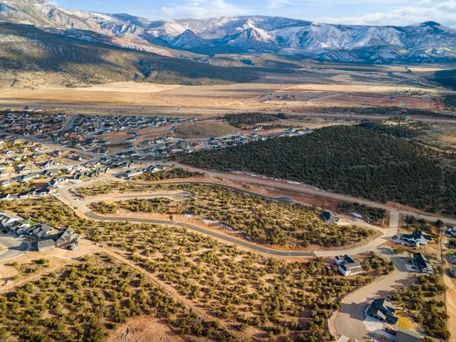 Aerial overview of property's location featuring mountains