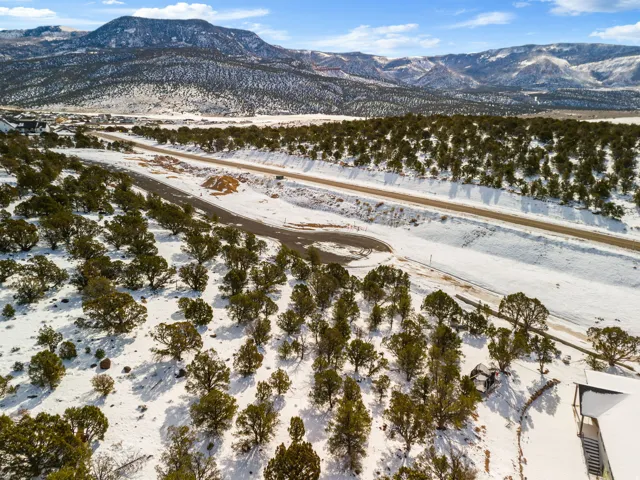 Snowy aerial view with a mountain view