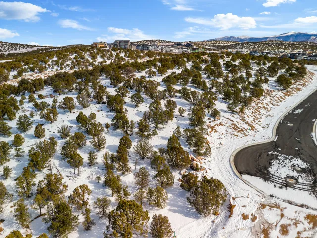 Snowy aerial view with a mountain view
