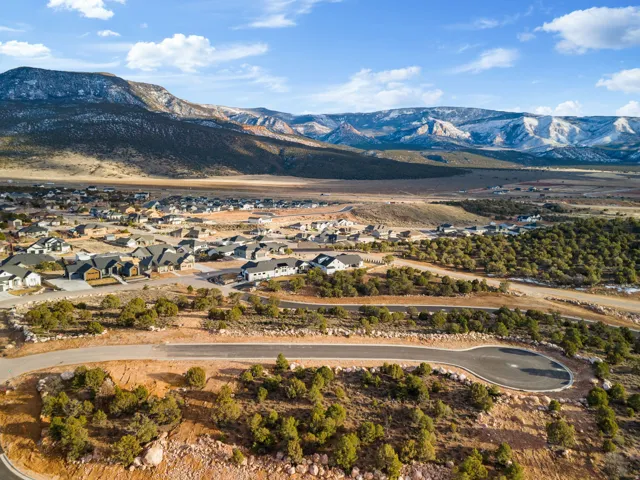 View of mountain backdrop with nearby suburban area