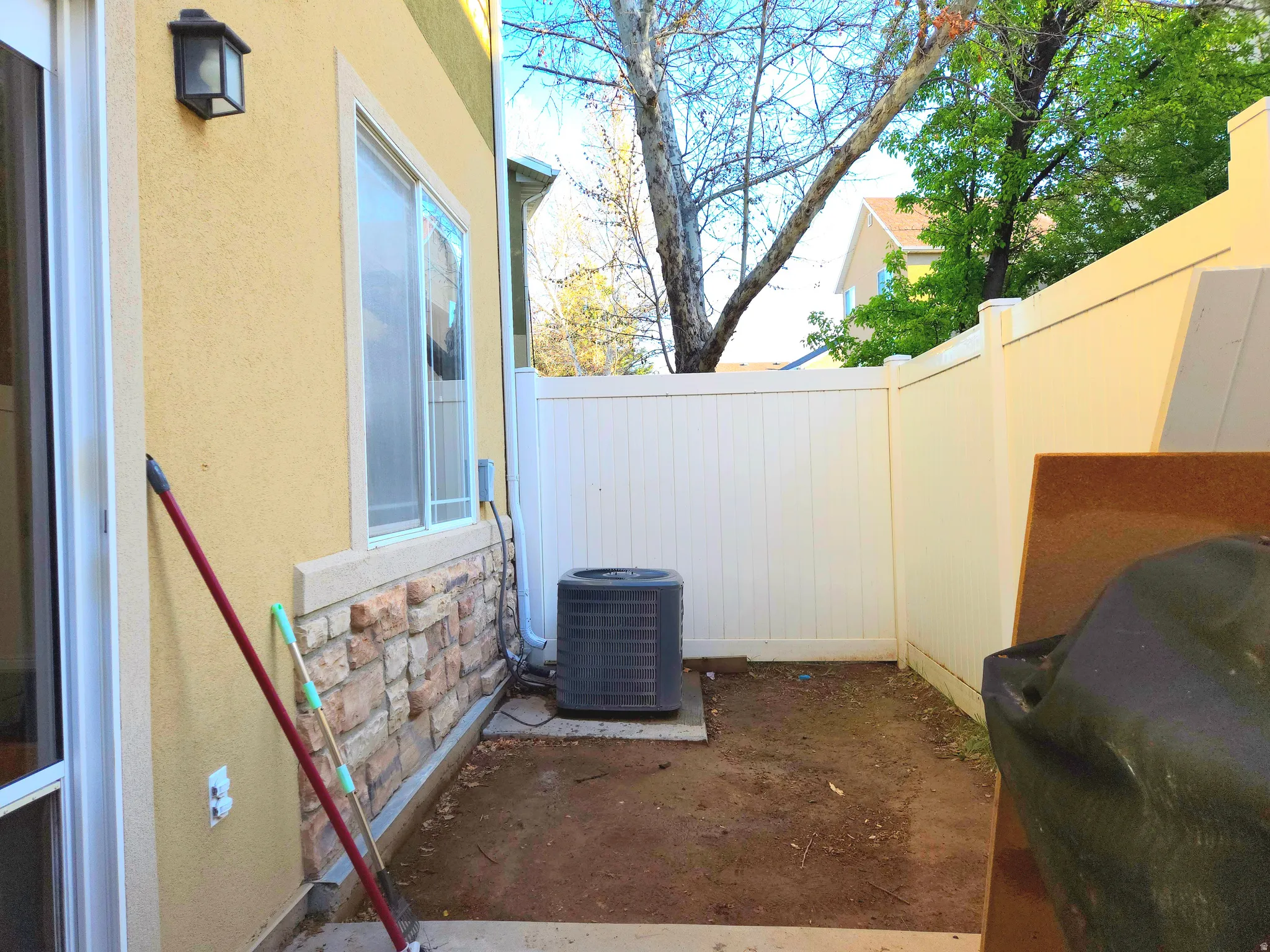 View of patio featuring a grill