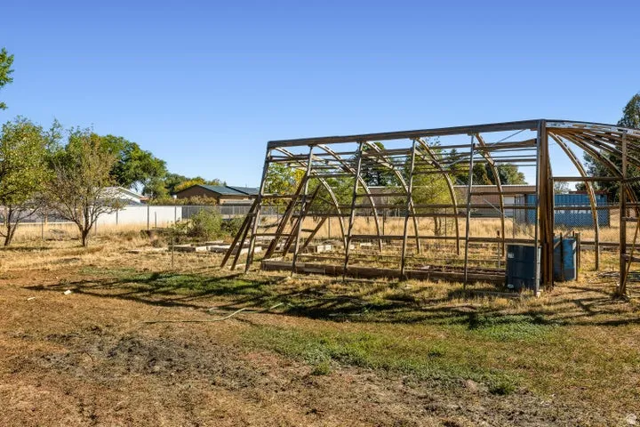 View of yard with an outbuilding