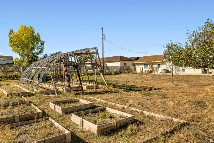 View of yard featuring a vegetable garden