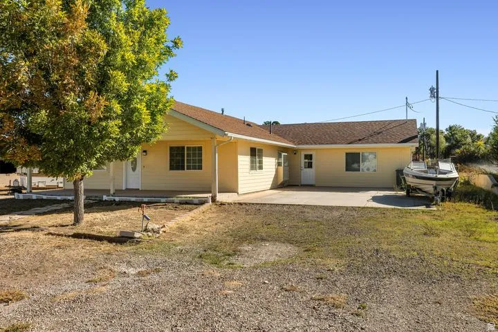 Back of property with a patio area