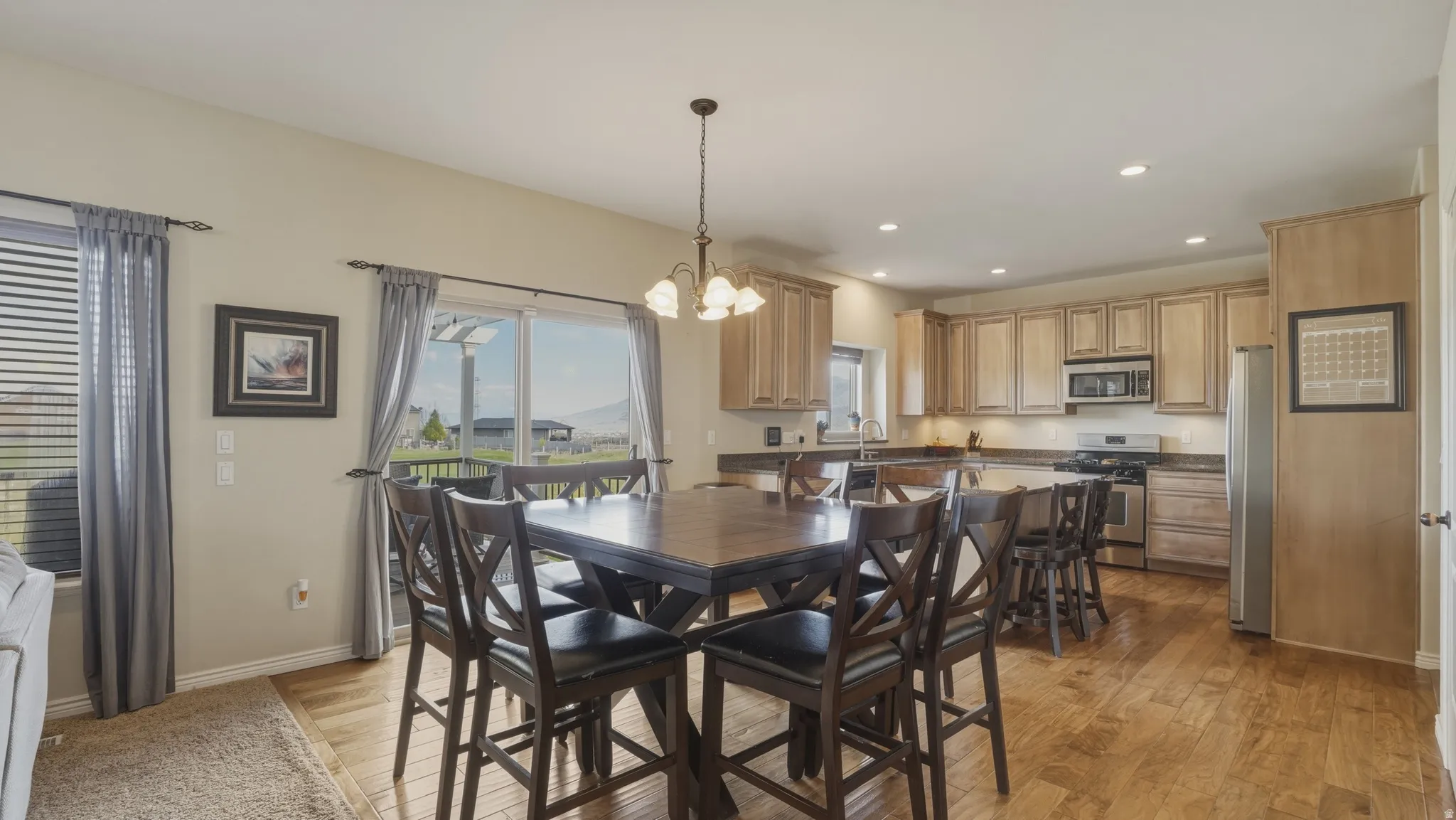 Dining room featuring a chandelier and light wood finished floors