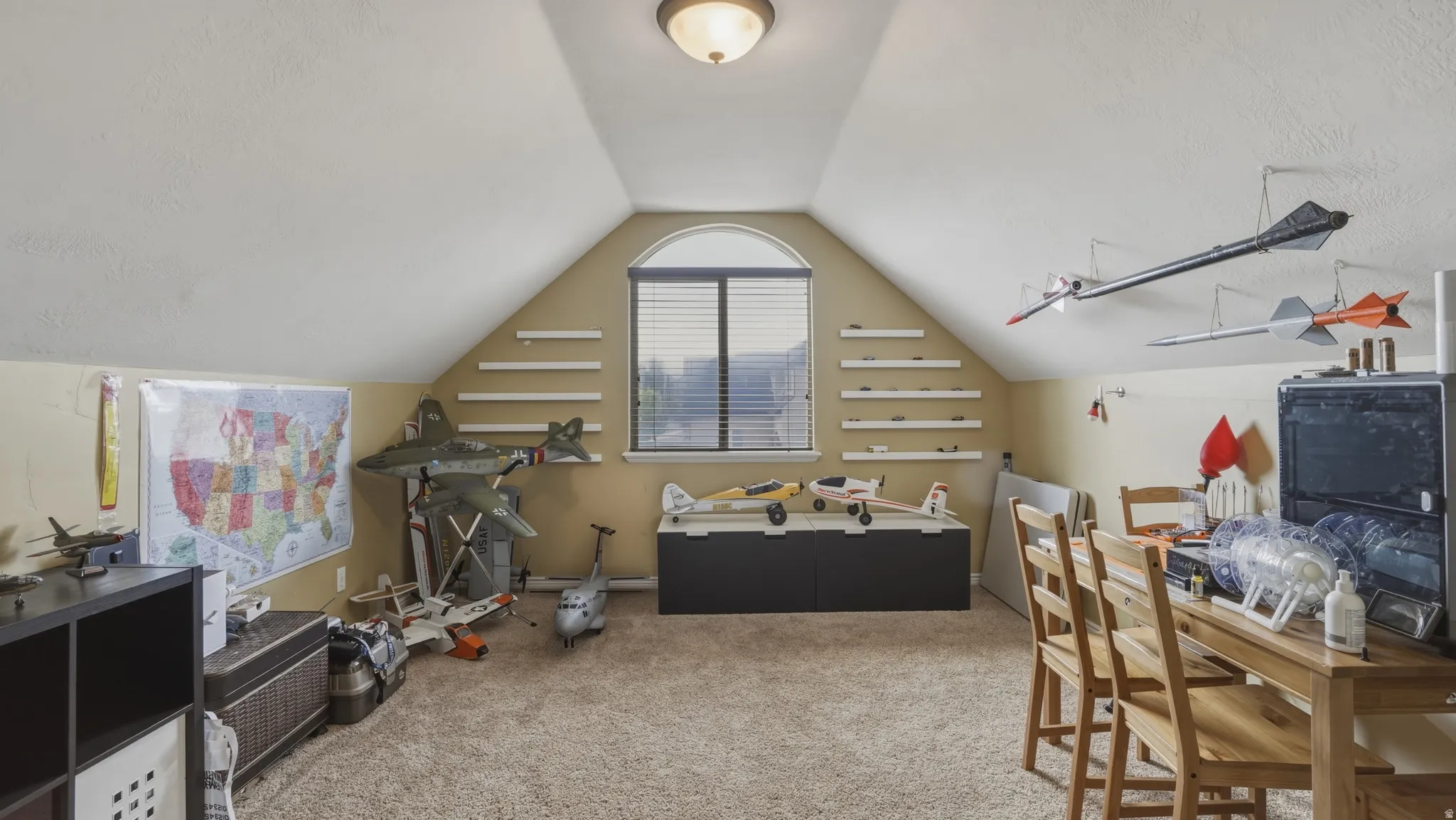 Office area featuring light colored carpet