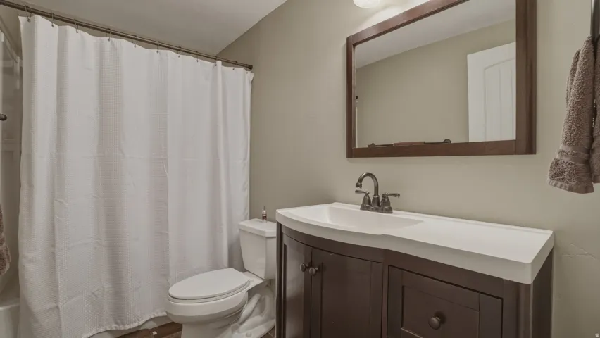 Bathroom with toilet and vanity
