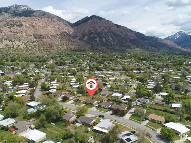 Aerial perspective of suburban area featuring mountains