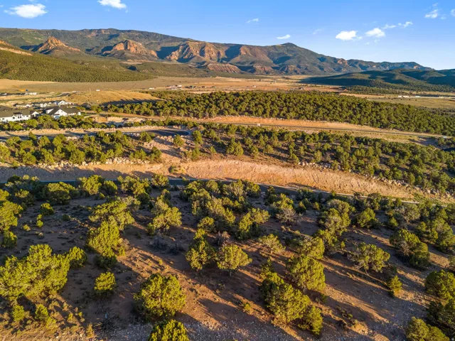 Expansive natural landscape with varied terrain and distant mountains