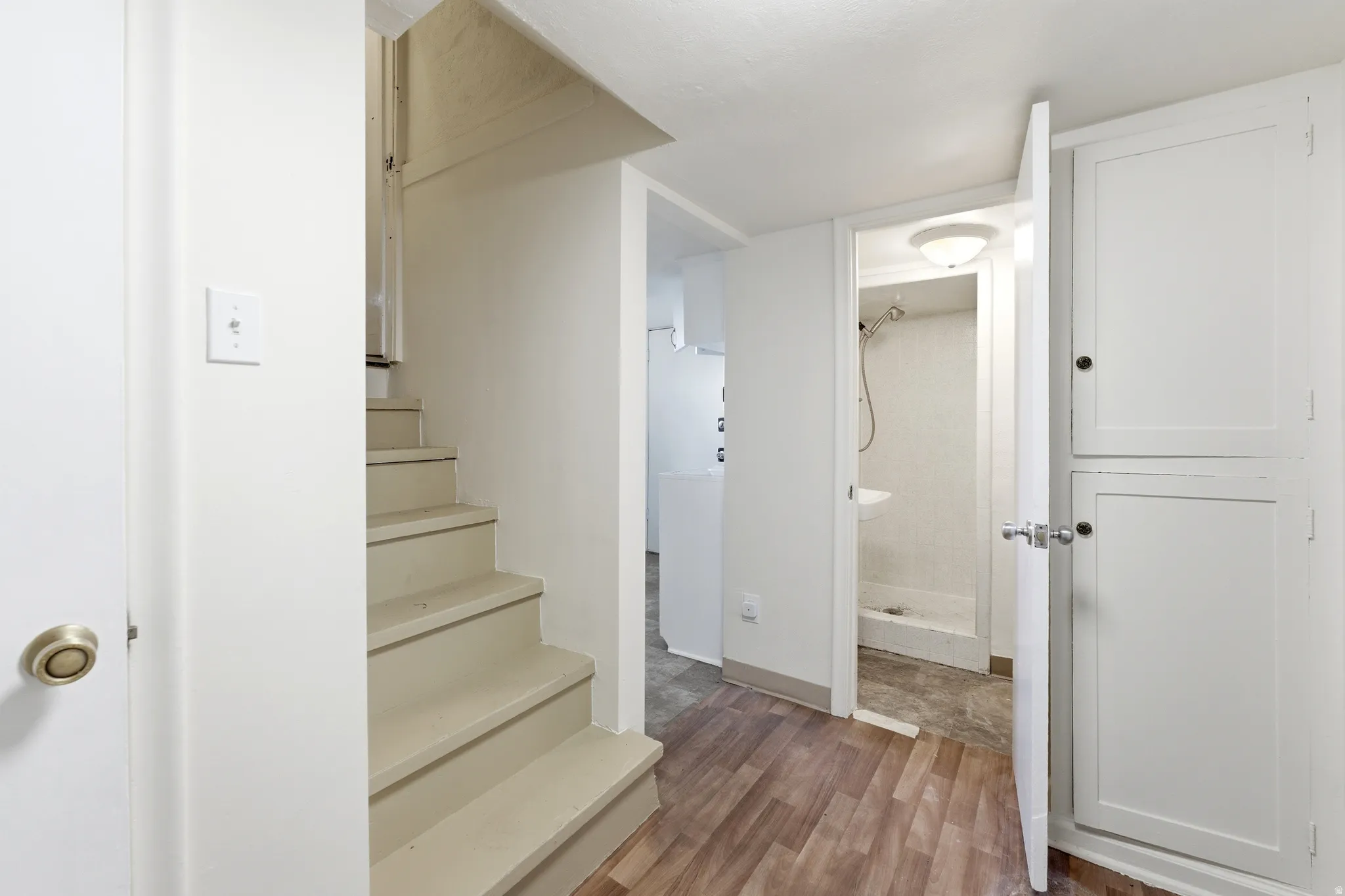 Stairway with wood finished floors