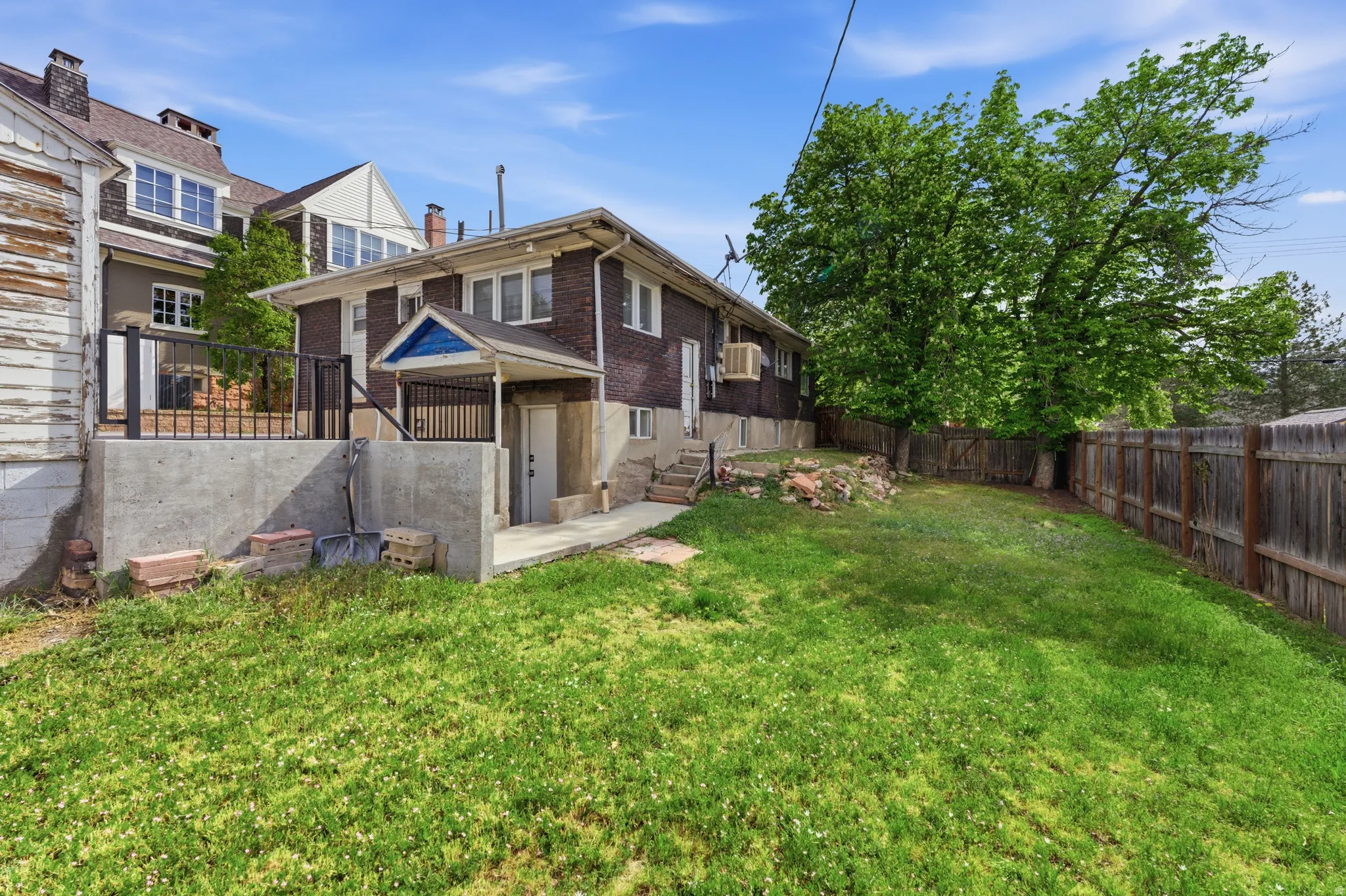 View of fenced backyard