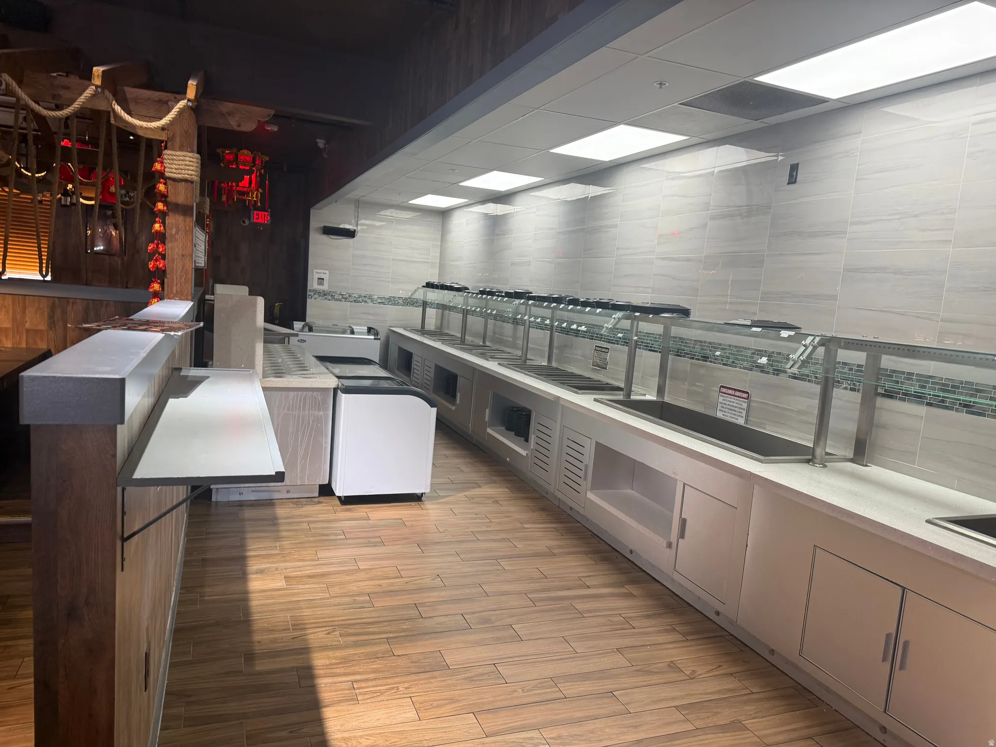 Kitchen featuring light countertops