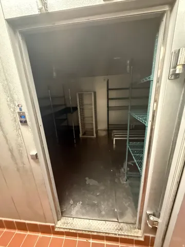 Detailed view of stainless steel fridge